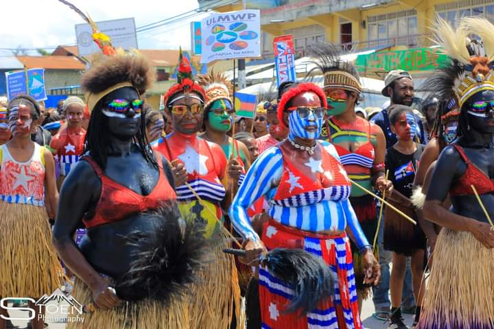 A celebration of Melanesian West Papuan identity, with a group of women in West Papuan dress.