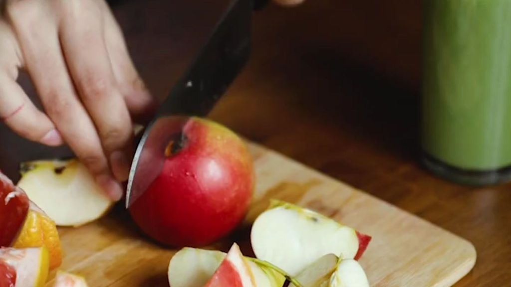 Palm oil free breakfast cereal - cutting up apple for granola