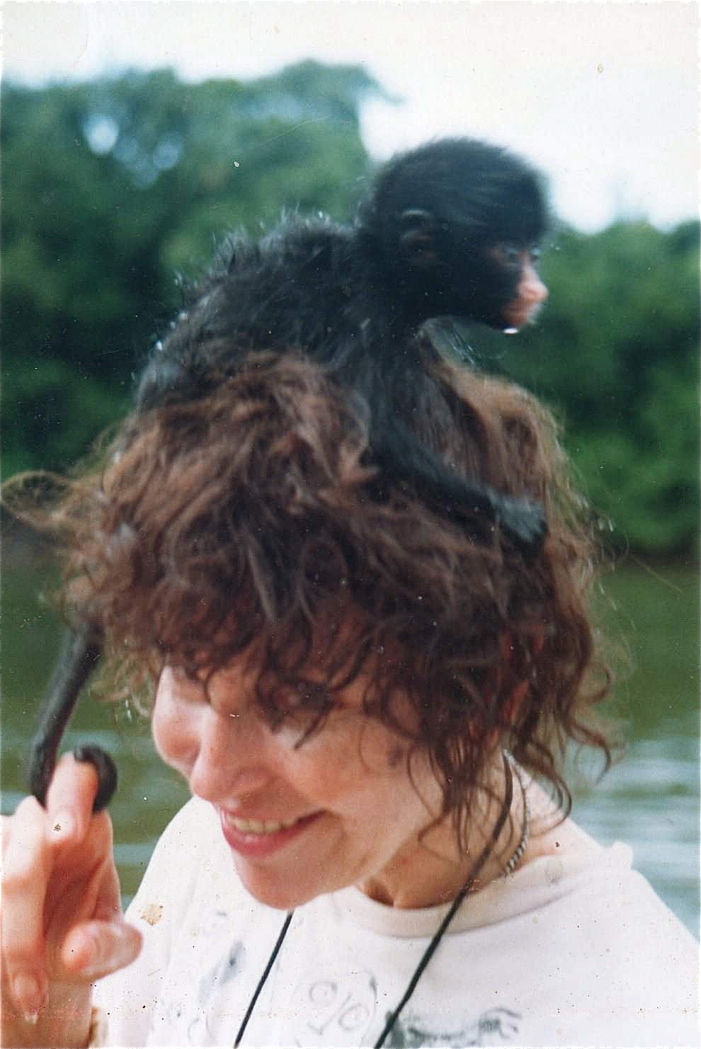 Baby spider monkey and Barbara Crane Navarro