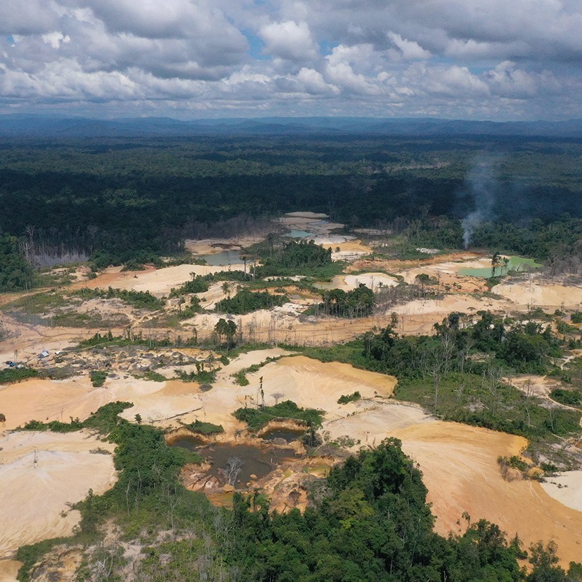 Illegal mining operations in Brazil such as the one shown here in the Yanomami Indigenous reserve pollute waterways and soil, and destroy the rainforest. Credit- João Laet:Guardian:eyevine