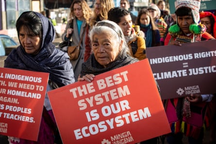 Indigenous leaders march at Cop26 in Glasgow. Land displacement often affects indigenous people who are key to protecting biodiversity. Photograph: Murdo MacLeod/The Guardian