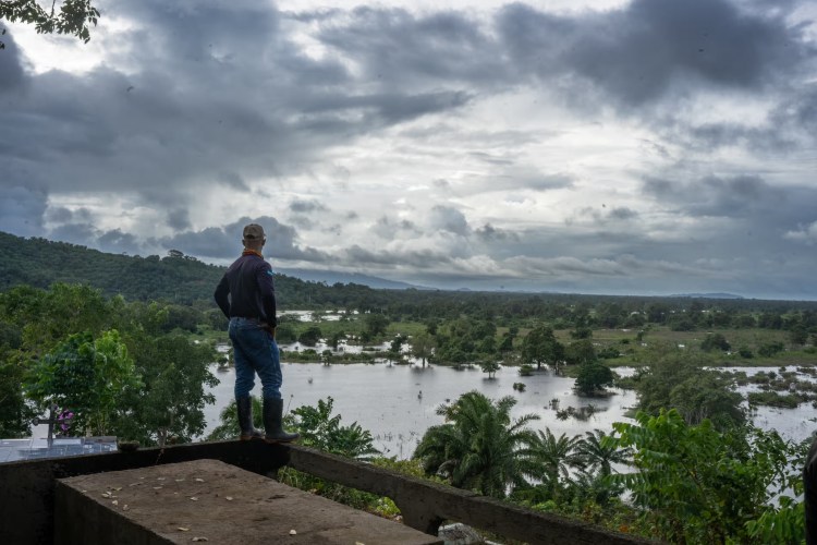 Cesar Ortega looks at an area deforested for oil palm plantations. “They have stopped because of flooding, but as soon as they can access this area again this will all become palma,” he says